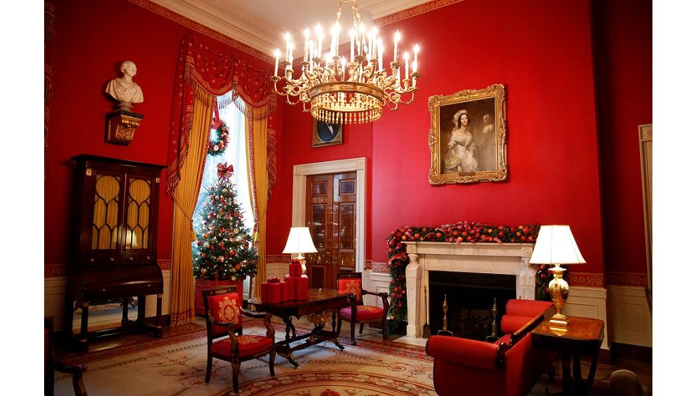 The Red Room is decked out during a holiday decor preview at the White House in Washington