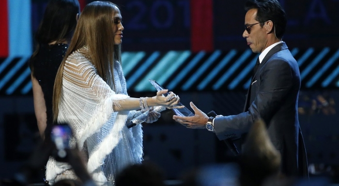 Lopez presents Anthony with an award honoring him as Latin Recording Academy person of the year at the 17th Annual Latin Grammy Awards in Las Vegas