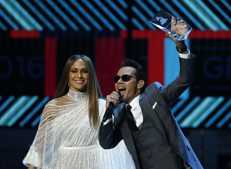 Anthony accepts an award from Lopez honoring him as Latin Recording Academy person of the year at the 17th Annual Latin Grammy Awards in Las Vegas