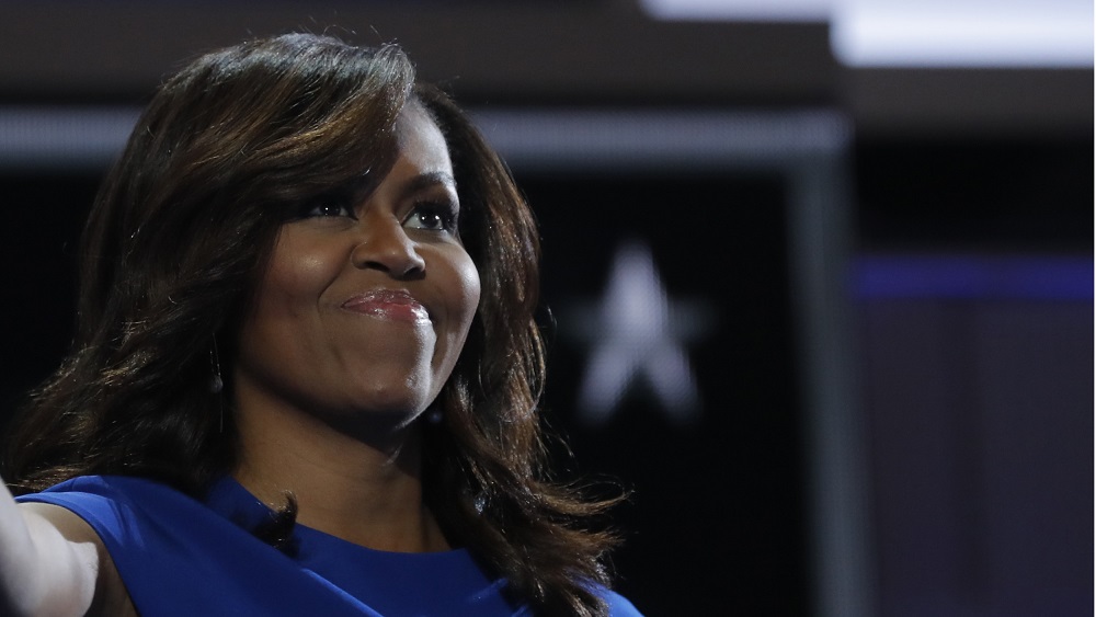 U.S. first lady Michelle Obama smiles after speaking during the first session at the Democratic National Convention in Philadelphia