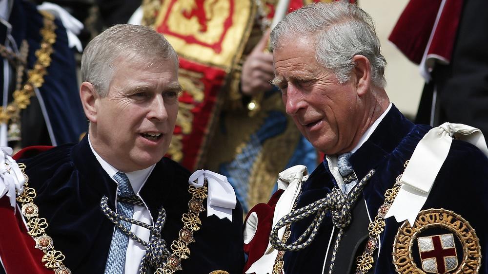 Britain's Prince Andrew and Prince Charles attend the annual Order of the Garter Service at St George's Chapel at Windsor Castle in Windsor