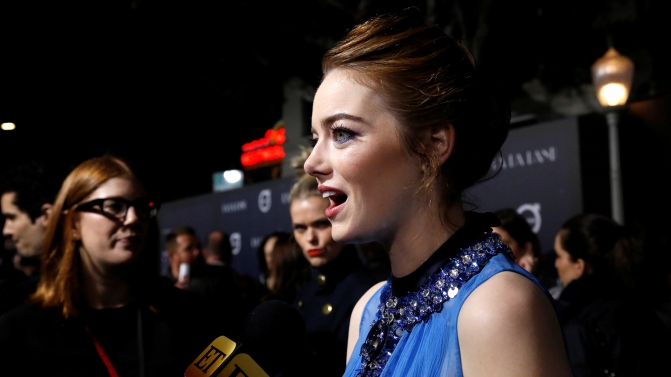 Cast member Stone is interviewed at the premiere of “La La Land” in Los Angeles