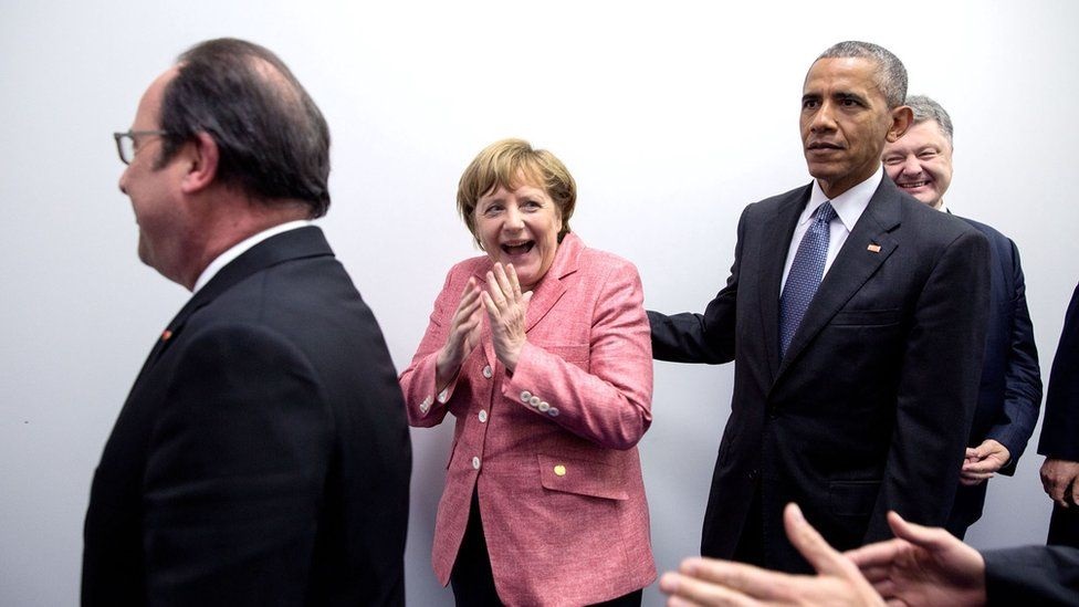 Julho: Com François Hollande e Angela Merkel num encontro com líderes europeus