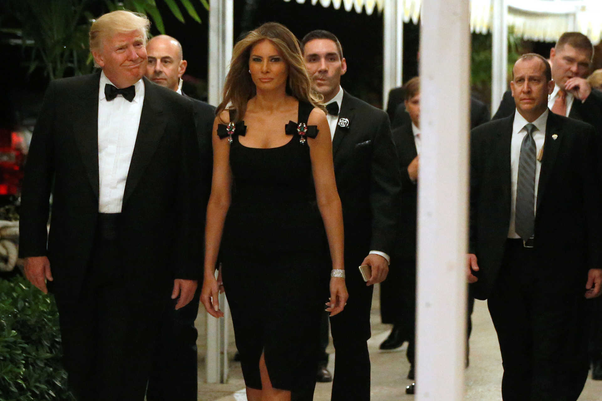 U.S. President-elect Donald Trump and his wife Melania Trump arrive for a New Year’s Eve celebration with members and guests at the Mar-a-lago Club in Palm Beach