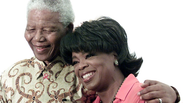 U.S. TALK SHOW PERSONALITY OPRAH WINFREY WITH FORMER SOUTH AFRICA
PRESIDENT NELSON MANDELA.
