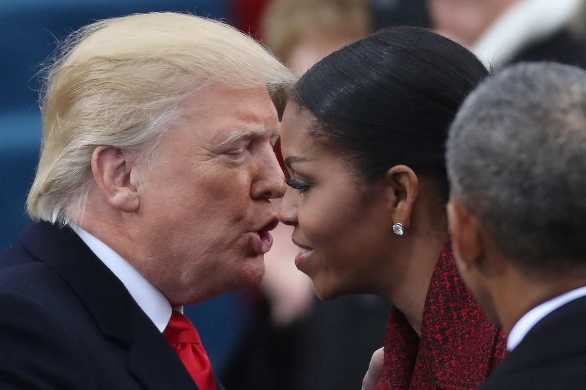 U.S. President-elect Donald Trump greets outgoing first lady Michelle Obama as President Barack Obama (R) looks on as they attends Trump’s inauguration ceremonies on the Capitol in Washington, U.S.