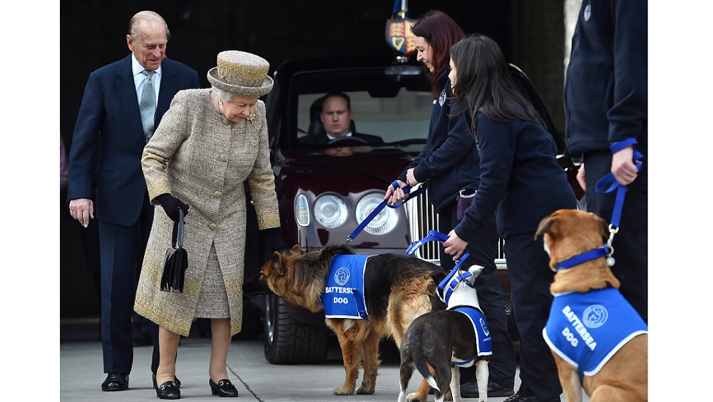 Britain’s Queen Elizabeth and and Prince Philip attend the opening of the new Mary Tealby dog kennels at Battersea Dogs & Cats Home in London