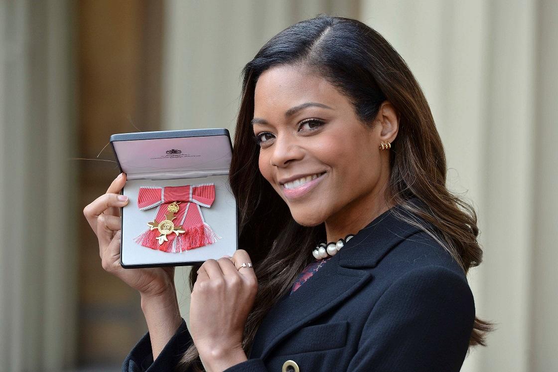 James Bond star Naomie Harris at Buckingham Palace after receiving her OBE medal from Queen Elizabeth