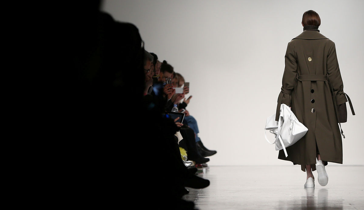 A model presents a creation at the Eudon Choi catwalk show during London Fashion Week in London
