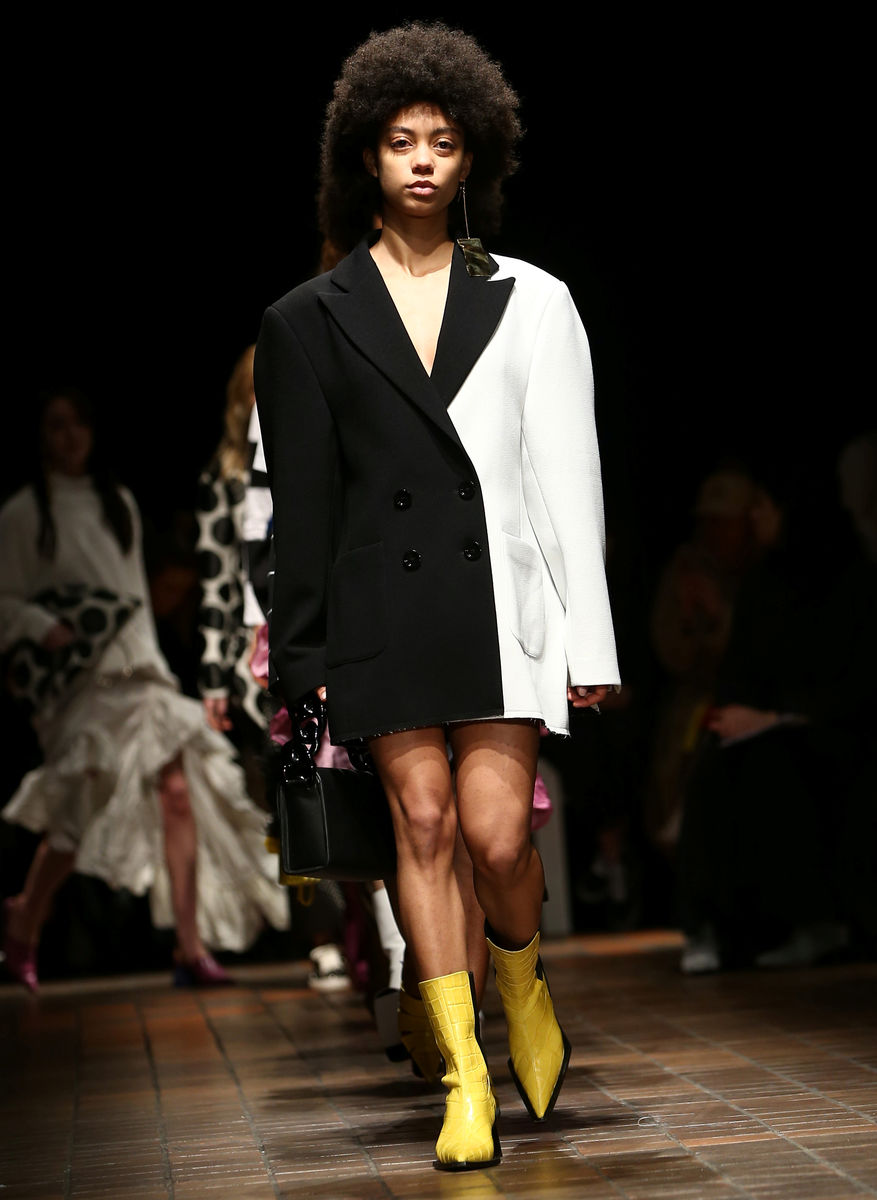 A model presents a creation at the Marques’ Almeida catwalk show during London Fashion Week in London