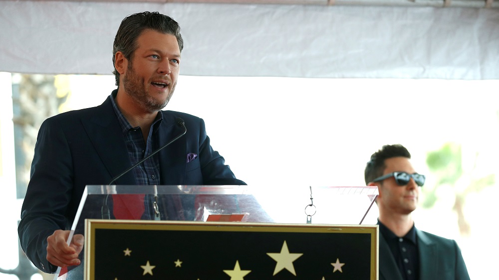 Musician Shelton speaks at the ceremony for the unveiling of the star for musician Levine on the Hollywood Walk of Fame in the Hollywood neighborhood of Los Angeles