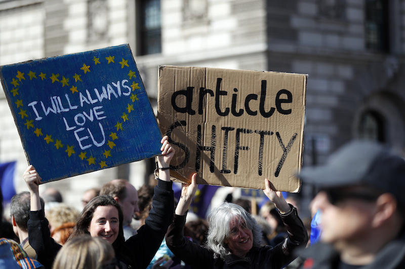 Demonstrators hold banners during a Unite for Europe march in central London