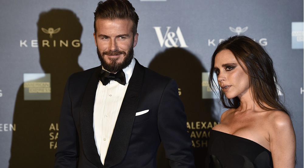 Victoria and David Beckham arrive for the Alexander McQueen: Savage Beauty exhibition gala at the Victoria & Albert Museum in London