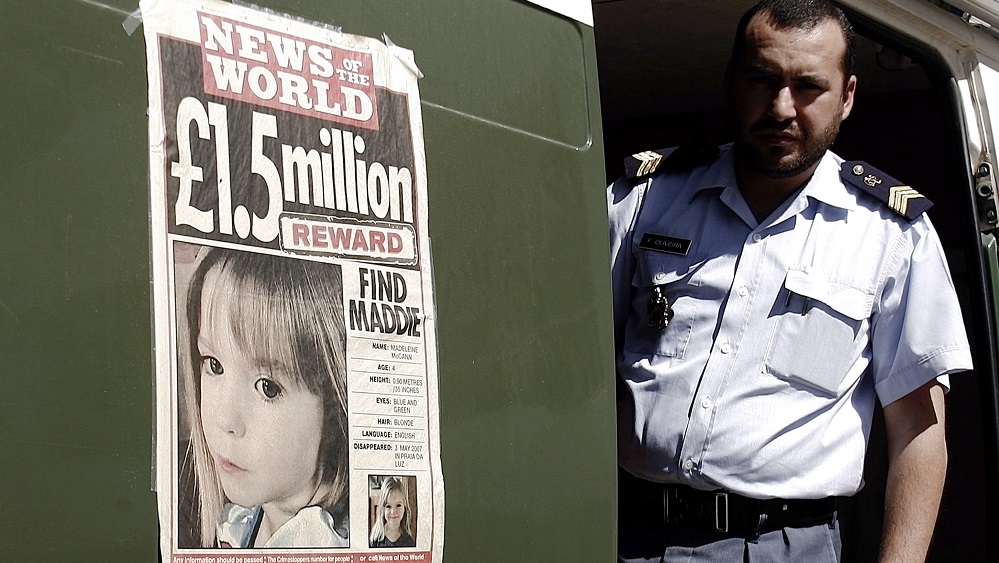 A poster of missing four-year-old Madeleine McCann is seen on a Police Republican Guard near Lagos