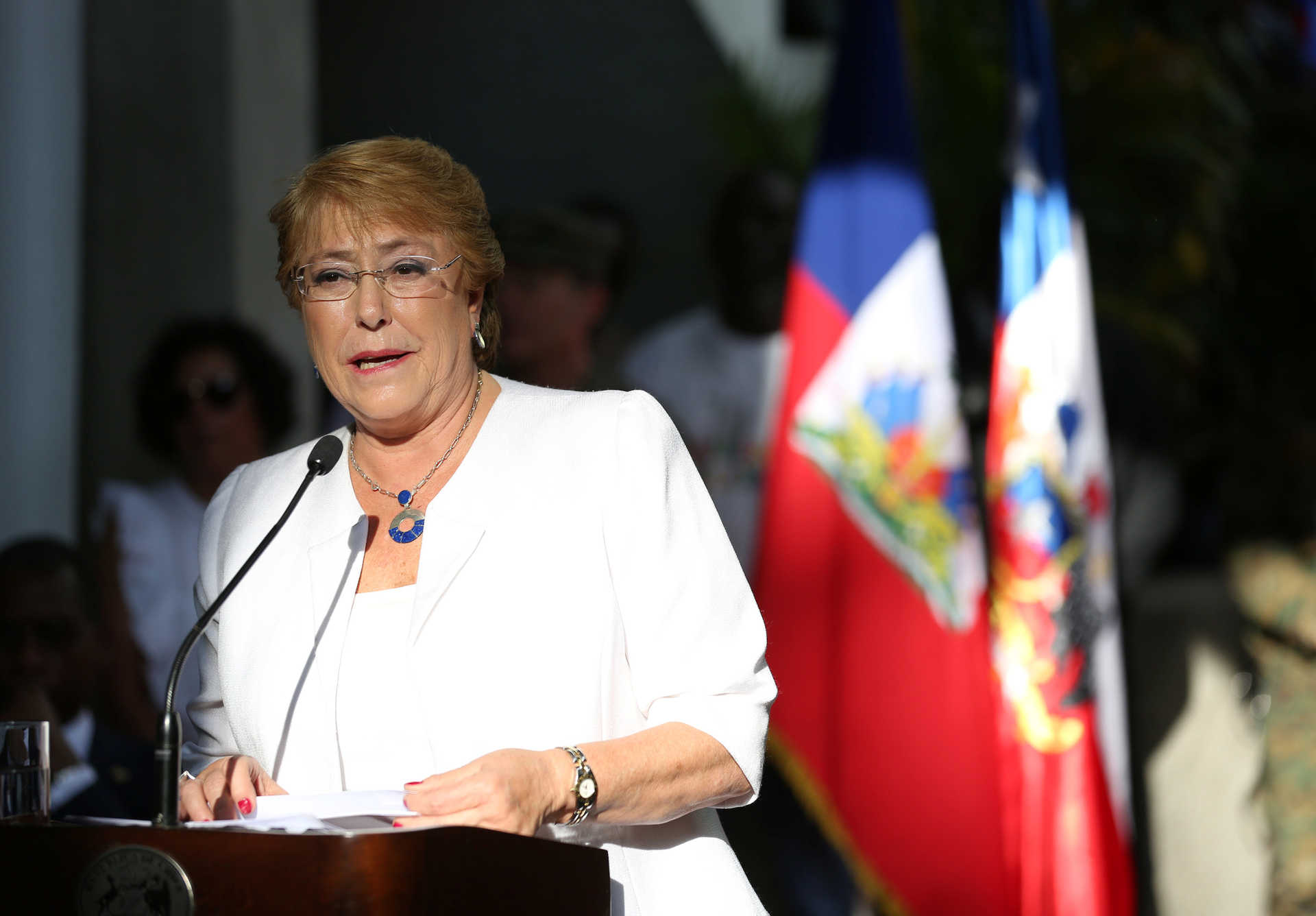 Chile's President Michelle Bachelet addresses the audience during a visit to the Ecole Nationale Republique du Chili in Port-au-Prince