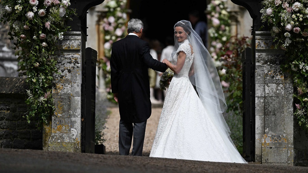 Pippa Middleton, the sister of Britain’s Catherine, Duchess of Cambridge, arrives for her wedding to James Matthews at St Mark’s Church in Englefield, west of London