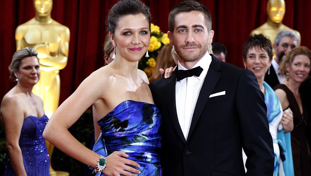 Maggie and brother Jake Gyllenhaal pose at the 82nd Academy Awards in Hollywood