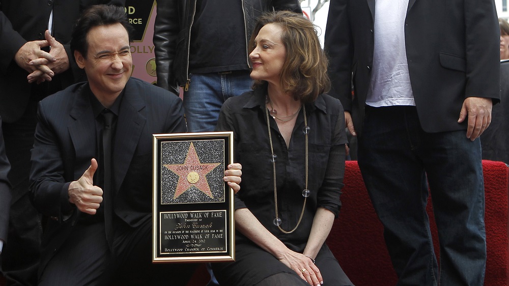Cusack gives the thumbs up while posing with his sister Cusack and actors Black, Aykroyd and Thornton after his star was unveiled on the Walk of Fame in Hollywood
