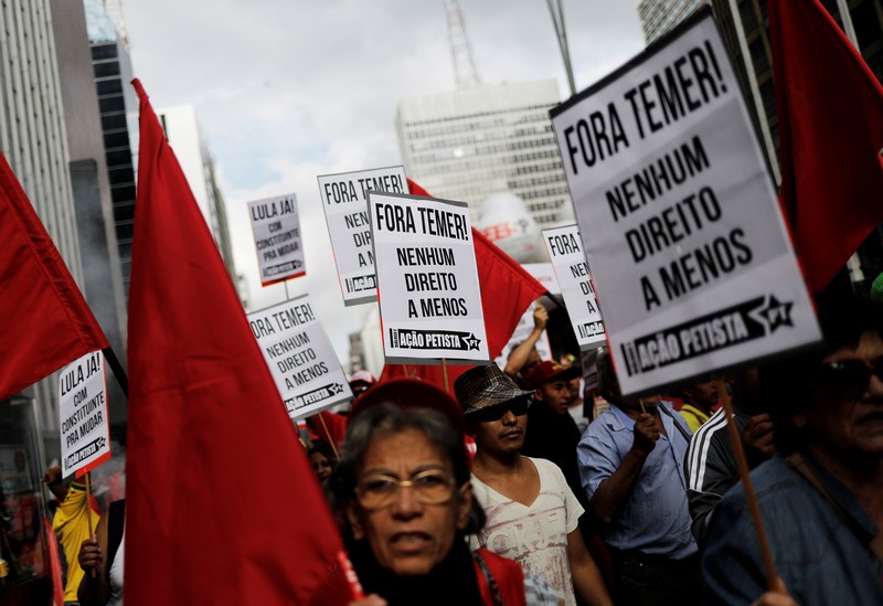 Trade unionists take part in a demonstration against Brazil’s President Temer on International Labour Day in Sao Paulo