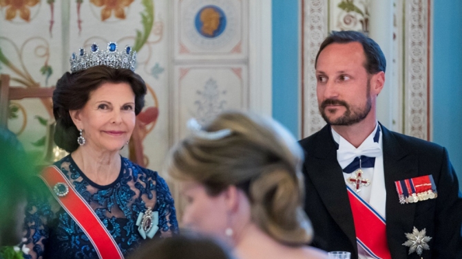 A combination picture shows Norway’s Crown Prince Haakon before and after he shaved off his beard as part of the entertainment during King Harald’s and Queen Sonja’s joint 80th birthday celebrations at the Royal Palace in Oslo, Norwa
