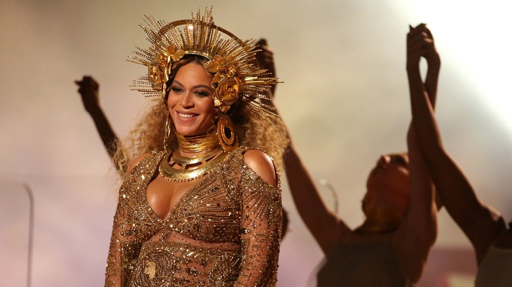 FILE PHOTO – Beyonce performs at the 59th Annual Grammy Awards in Los Angeles