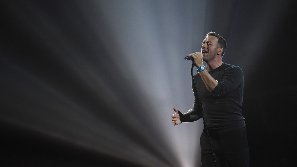 Chris Martin of Coldplay performs a tribute to George Michael at the Brit Awards at the O2 Arena in London