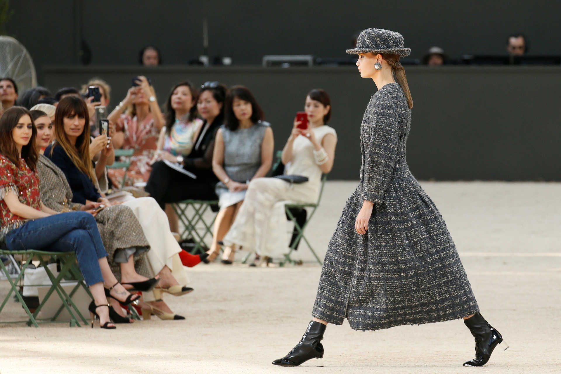 A model presents a creation by German designer Karl Lagerfeld as part of his Haute Couture Fall/Winter 2017/2018 collection for fashion house Chanel in Paris