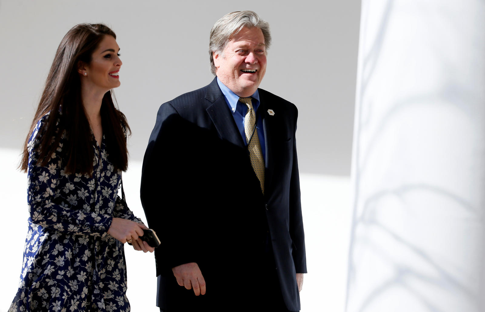 White House Chief Strategist Bannon and senior adviser Hicks walk to joint press conference at the White House in Washington