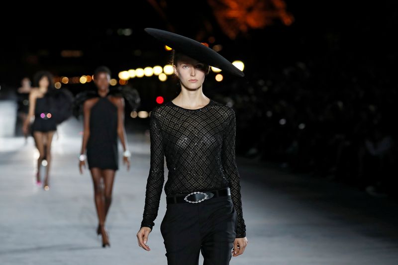 A model presents a creation by designer Anthony Vaccarello as part of his Spring/Summer 2018 women’s ready-to-wear collection show  for fashion house Saint Laurent during Paris Fashion Week