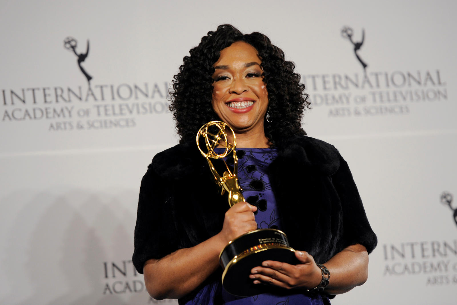 Shonda Rhimes poses in the press room with the Founders Award International Emmy in Manhattan, New York