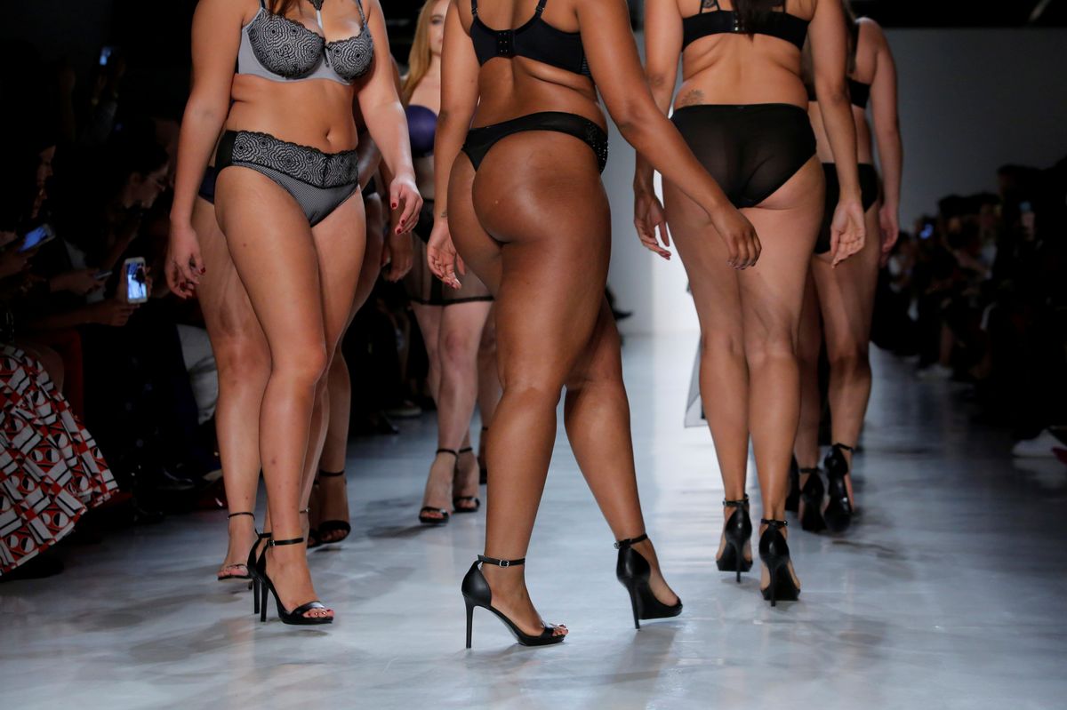 Models walk the runway during the Addition Elle Spring/Summer 2018 presentation at New York Fashion Week in Manhattan, New York.