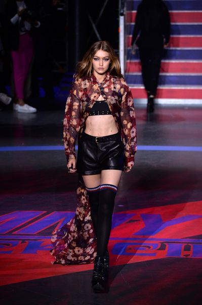 Model Gigi Hadid displays a creation from the Tommy Hilfiger Spring/Summer 2018 show in a presentation at London Fashion Week