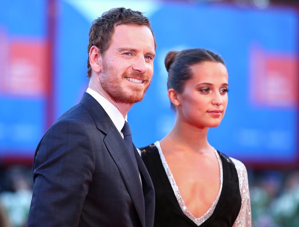 Actors Michael Fassbender and Alicia Vikander attend the red carpet event for the movie “The Light Between Oceans” at the 73rd Venice Film Festival in Venice