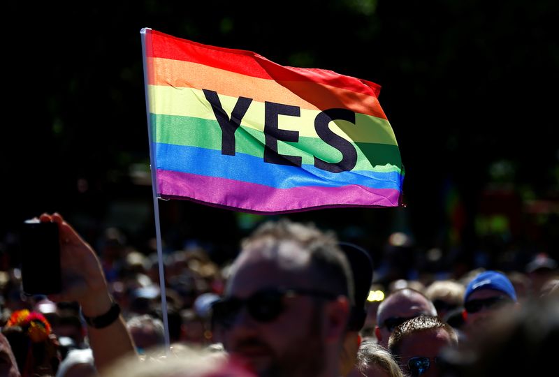 Supporters of the ‘Yes’ vote for marriage equality celebrate after it was announced the majority of Australians support same-sex marriage in a national survey, at a rally in Sydney