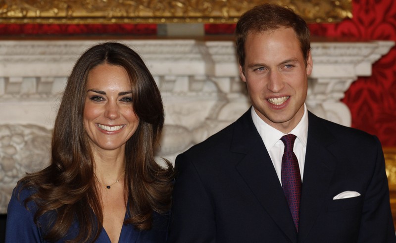 Britain’s Prince William and his fiancee Kate Middleton pose for a photograph in St. James’s Palace in central London