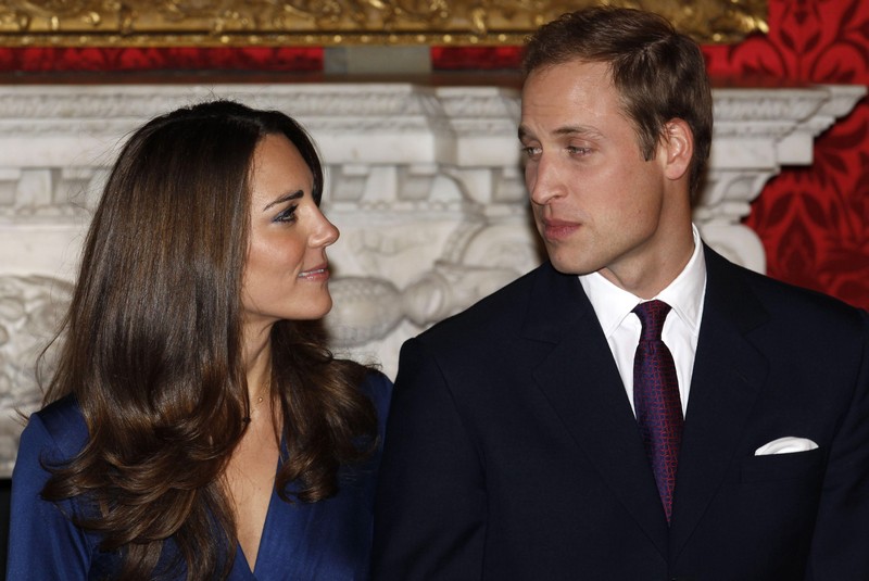 Britain’s Prince William and his fiancee Kate Middleton pose for a photograph in St. James’s Palace in central London