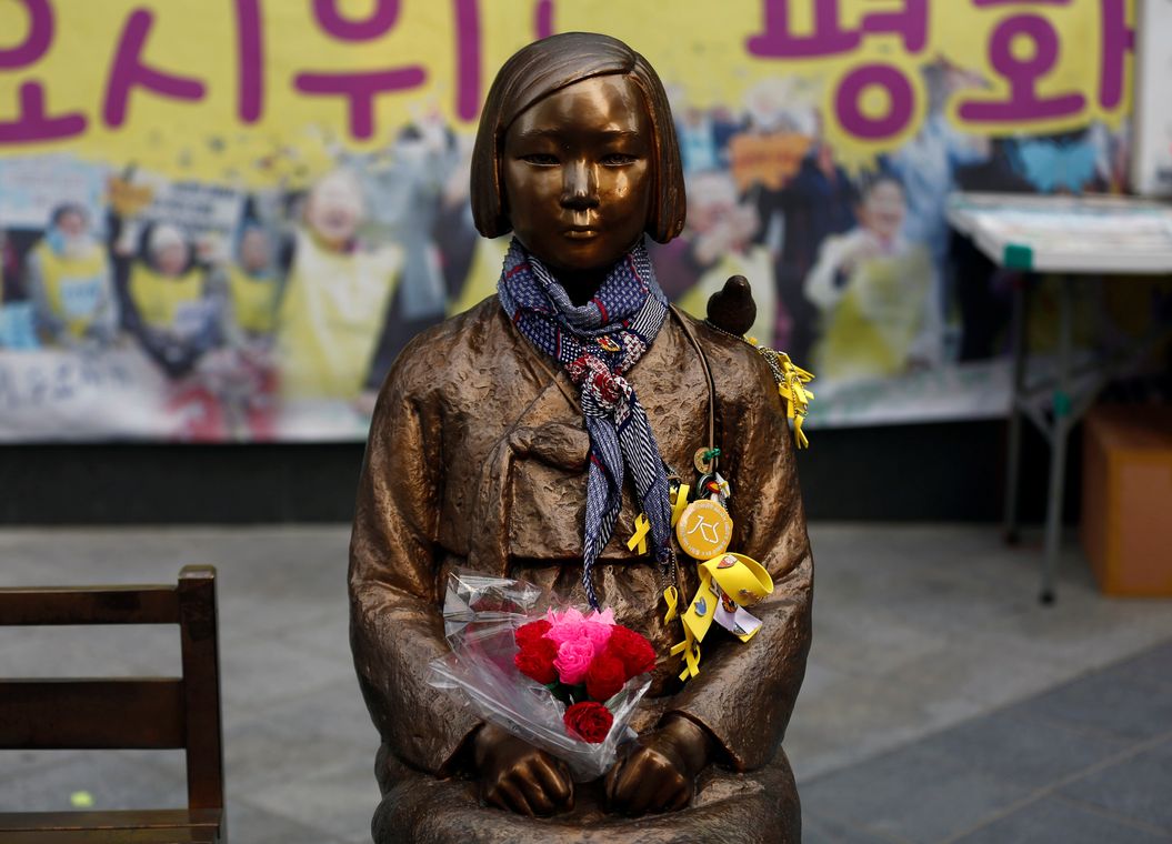A “comfort woman” statue in front of Japanese embassy is pictured in Seoul