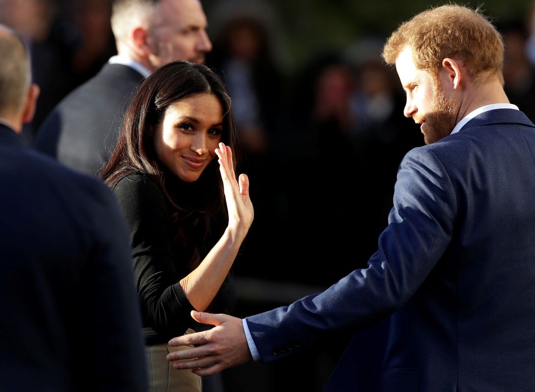 Meghan Markle, accompanied by her fiancee Britain’s Prince Harry, visits the Nottingham Academy school in Nottingham
