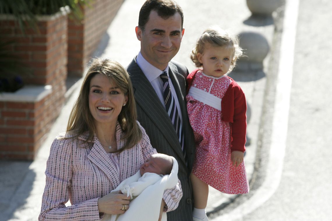 Spain’s Princess Letizia holds her newborn Infanta Sofia as they leave a hospital with Crown Prince Felipe and Infanta Leonor in Madrid