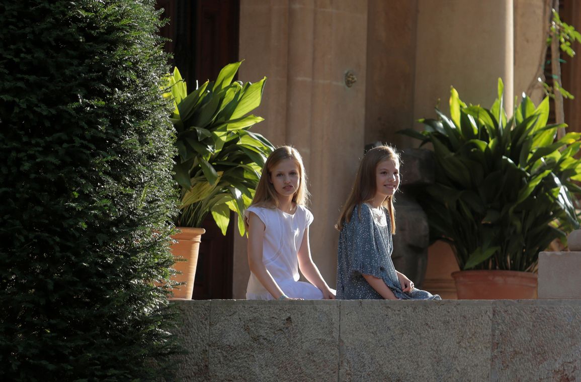 Spain’s Princess Leonor and Princess Sofia pose at Marivent Palace during their summer holidays in the Palma de Mallorca