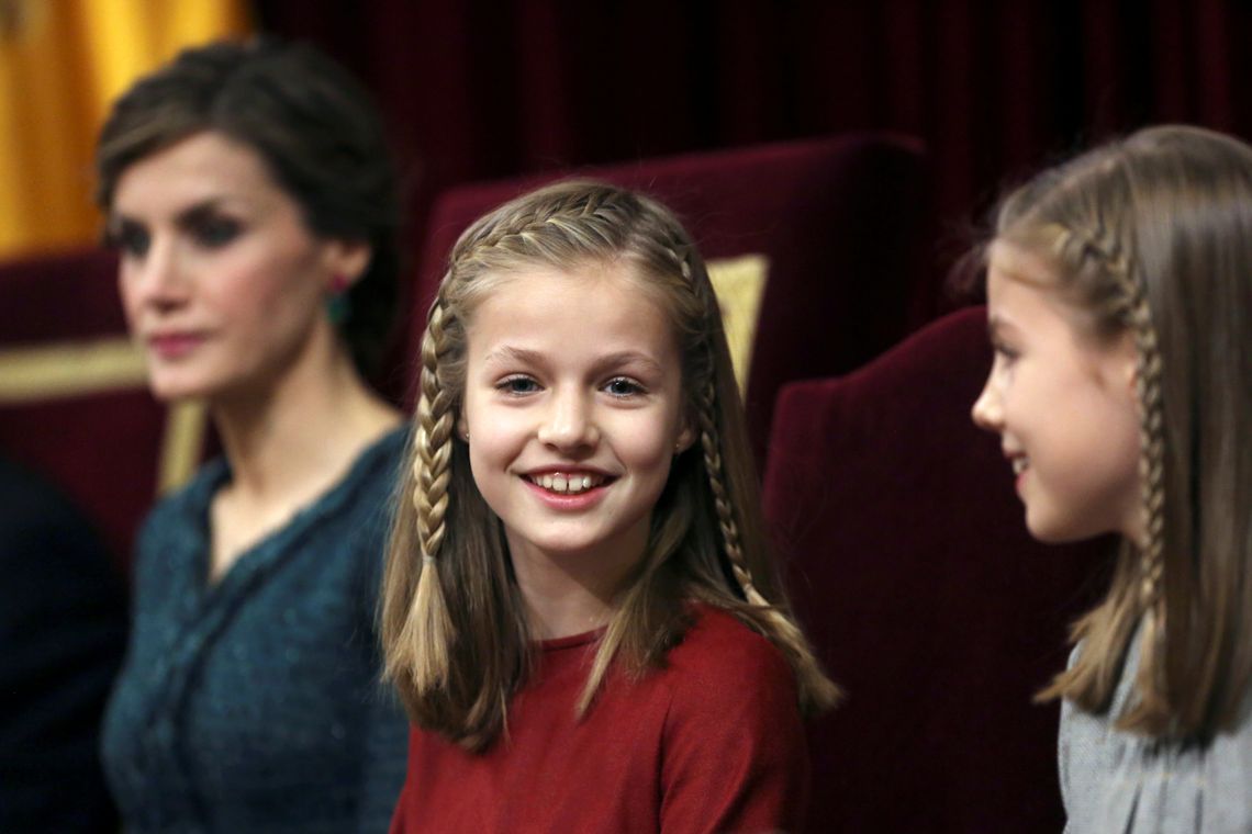 Queen Letizia of Spain sits next to Princess Leonor and Princess Sofia during a ceremony to inaugurate the XII Legislature at Parliament in Madrid
