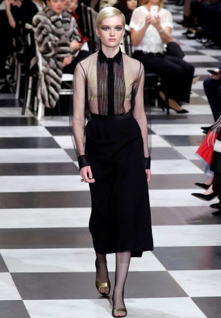 A model presents a creation by designer Maria Grazia Chiuri for Christian Dior’s Haute Couture Spring-Summer 2018 fashion collection in Paris