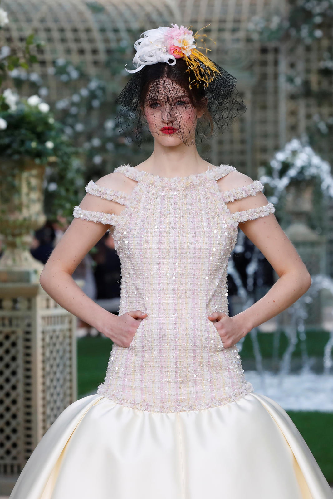 A model presents a creation by German designer Karl Lagerfeld as part of his Haute Couture Spring-Summer 2018 fashion collection for fashion house Chanel in Paris