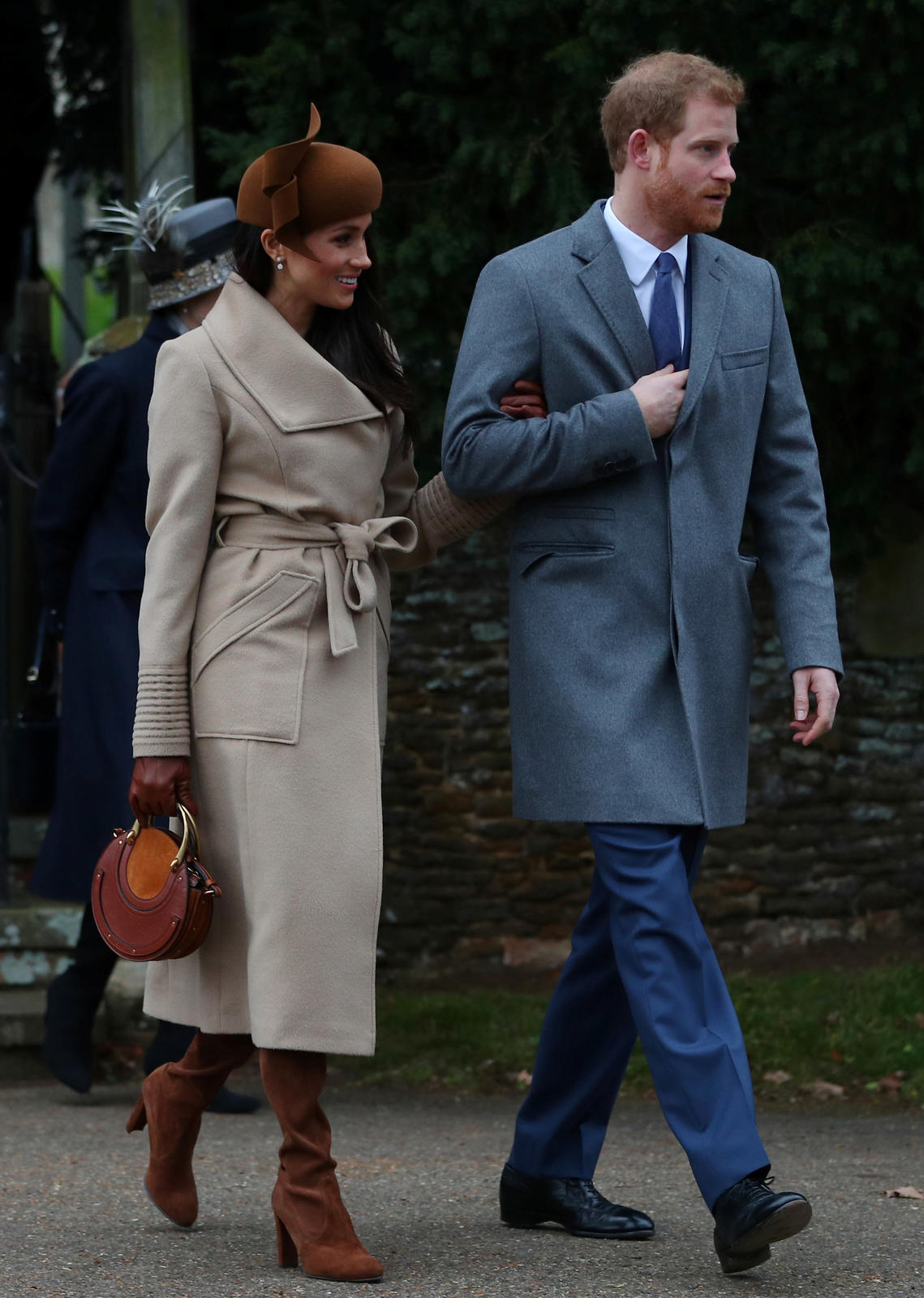 Britain’s Prince Harry and his fiancee Meghan Markle leave St Mary Magdalene’s church after the Royal Family’s Christmas Day service on the Sandringham estate in eastern England