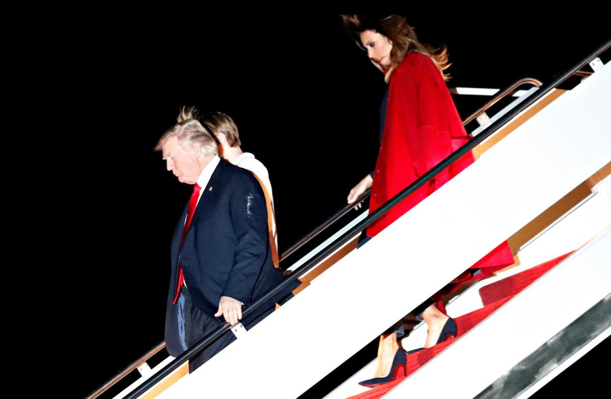 President Donald Trump arrives with first lady Melania and their son Barron at Palm Beach International Airport in West Palm Beach
