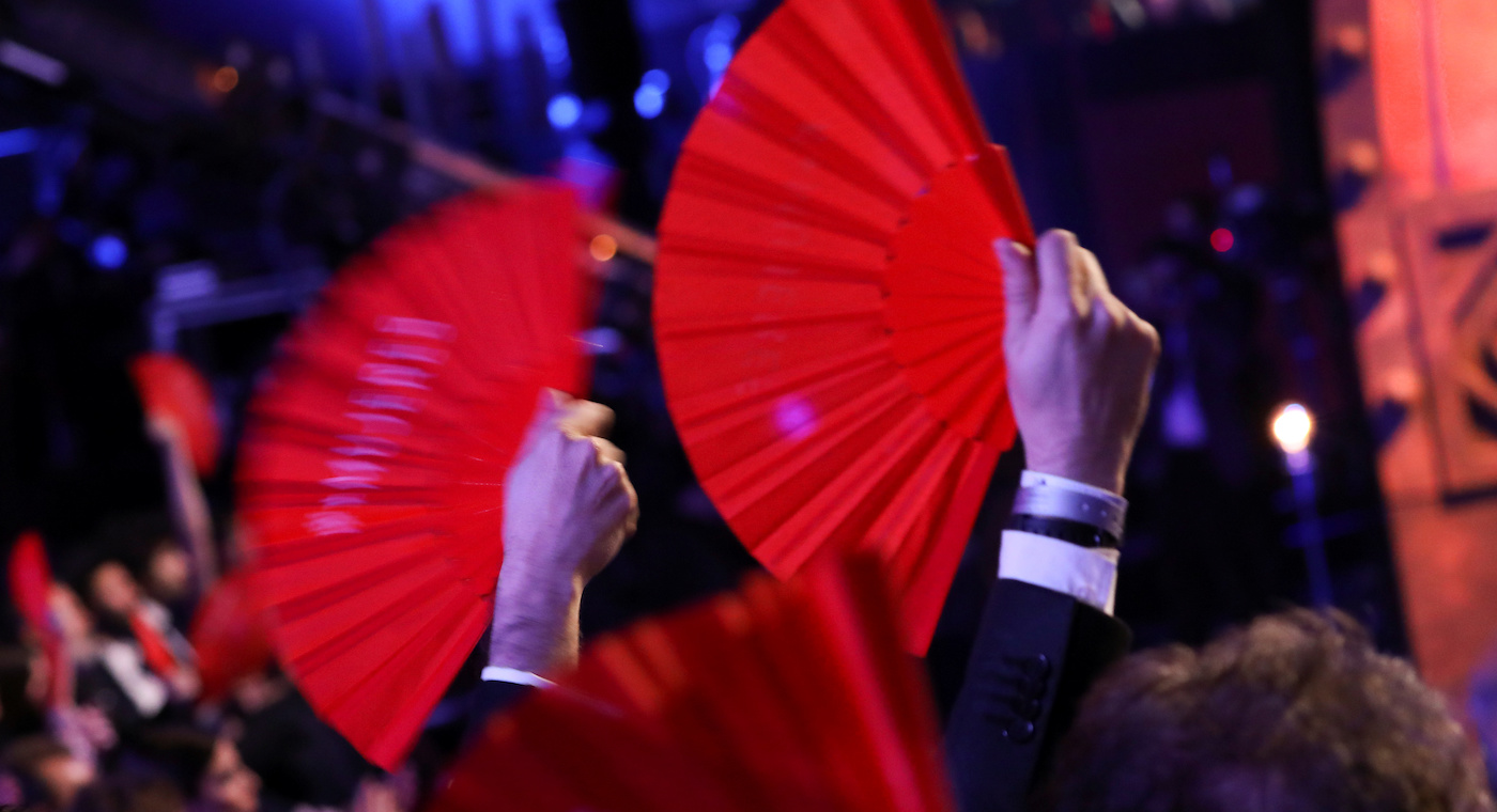 People hold up their fans during the Spanish Film Academy's Goya Awards ceremony in Madrid