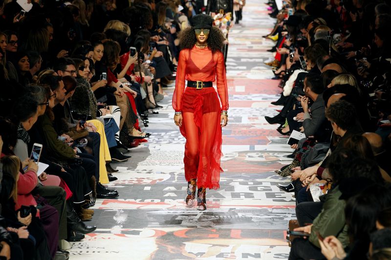 A model presents a creation by designer Maria Grazia Chiuri as part of her Autumn/Winter 2018-2019 women’s ready-to-wear collection show for fashion house Dior