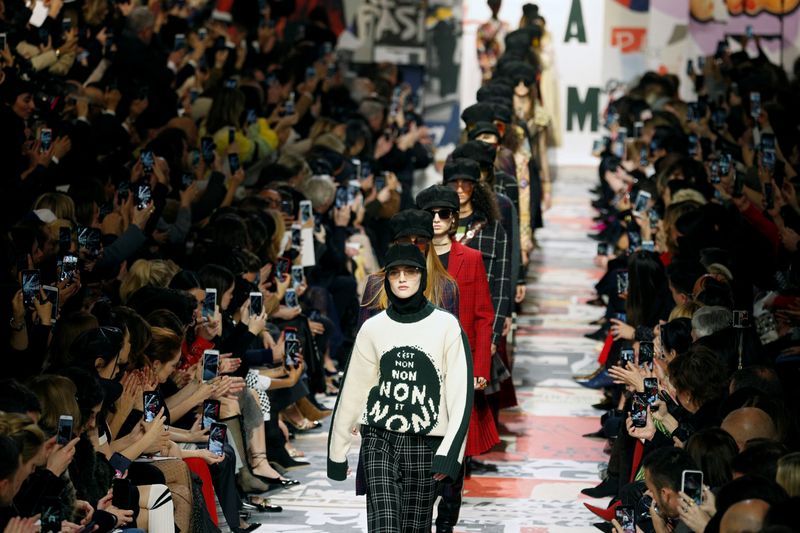 Models present creations by designer Maria Grazia Chiuri as part of her Autumn/Winter 2018-2019 women’s ready-to-wear collection show for fashion house Dior