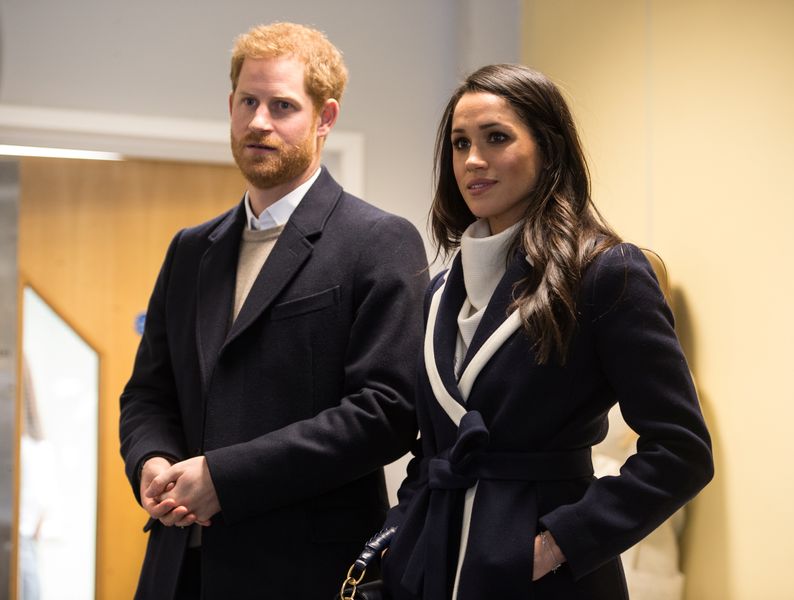 Britain’s Prince Harry and his fiancee Meghan Markle watch Coach Core apprentices taking part in a training masterclass exercise at Nechells Wellbeing Centre in Birmingham