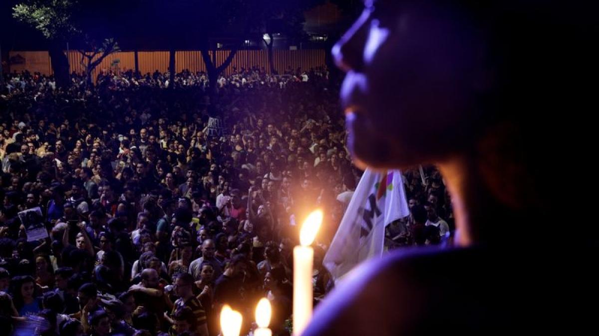 A demonstrator reacts during a rally against the death of Rio de Janeiro city councilor Marielle Franco, who was shot dead in Rio de Janeiro, Brazil